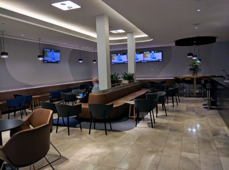 a room with a large table and chairs