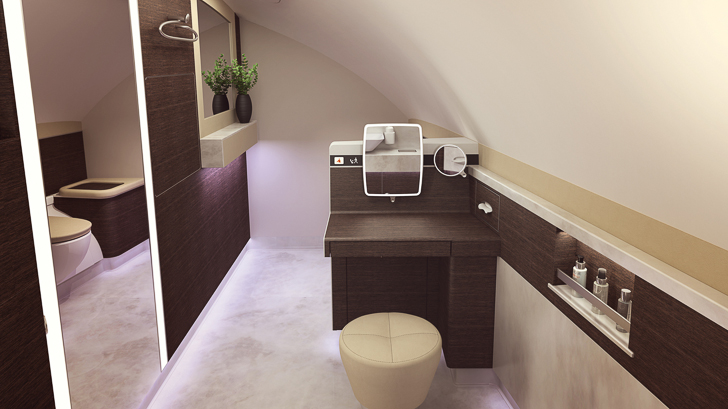 a bathroom with a round mirror and a stool