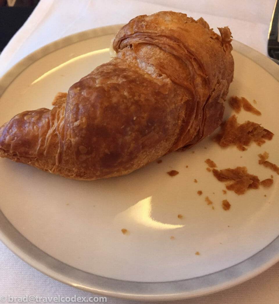 a croissant on a plate