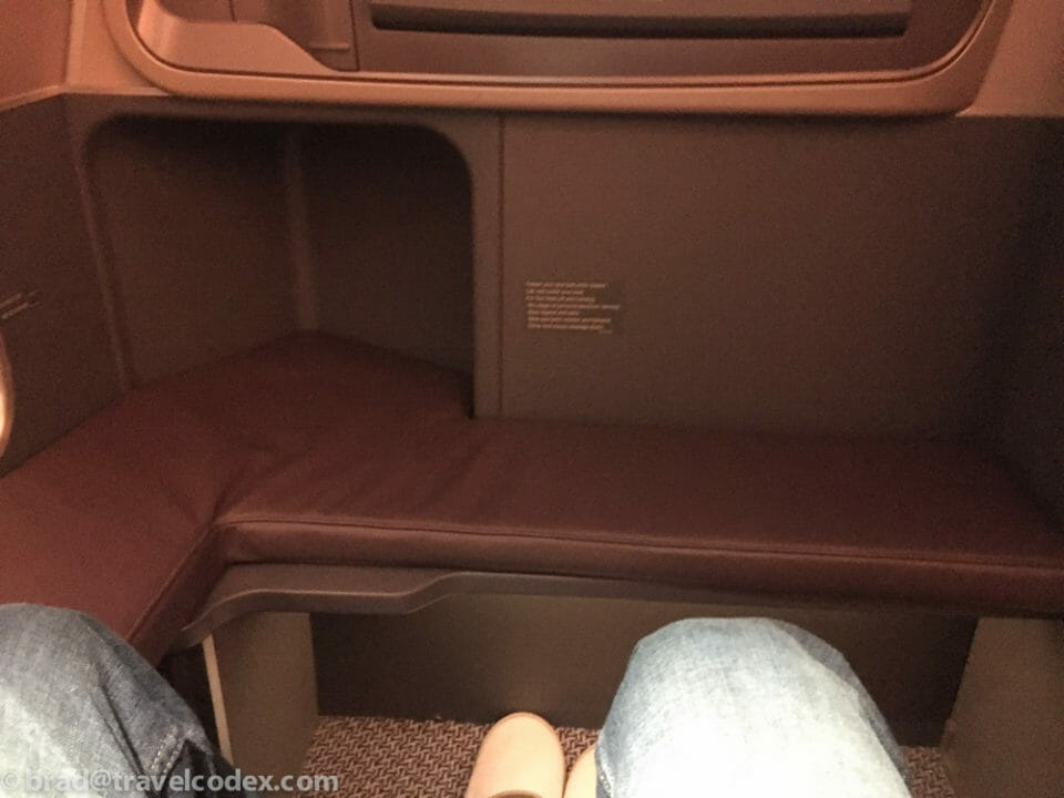 a person's legs in a seat