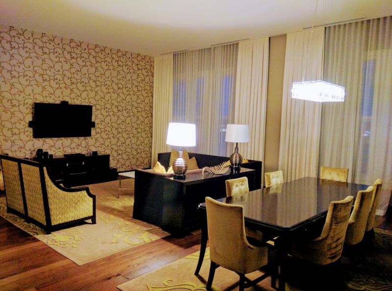 a room with a table and chairs