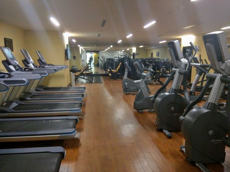 a room with treadmills and exercise machines