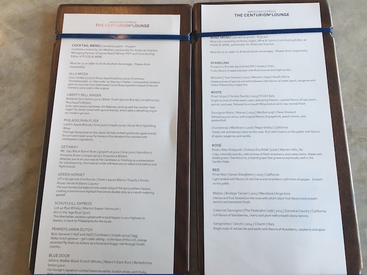a menu on a wood surface