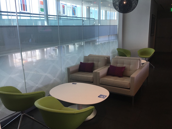 a room with a table and chairs