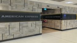 a reception area with a sign
