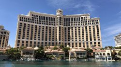 a large building with many windows with Bellagio in the background