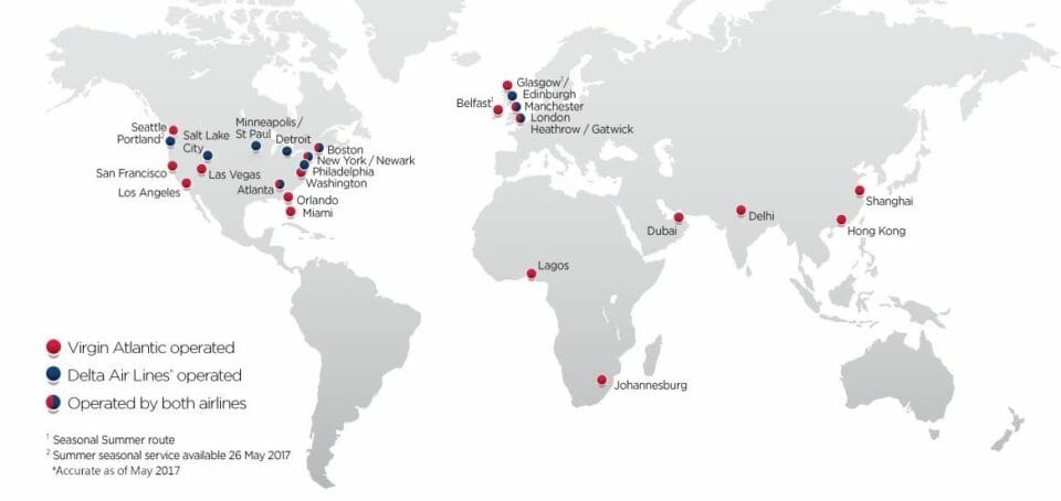 a map of the world with red dots