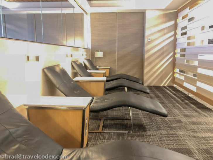 a room with chairs and a wall