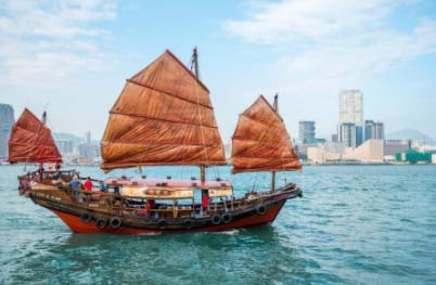 a boat with sails in the water