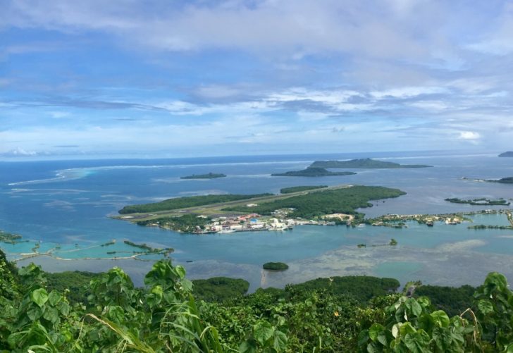 a body of water with islands and buildings