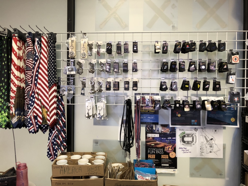 a display of badges and lanyards