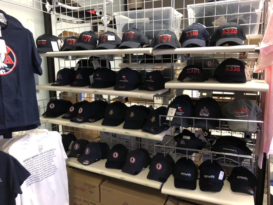 a shelf with hats on it