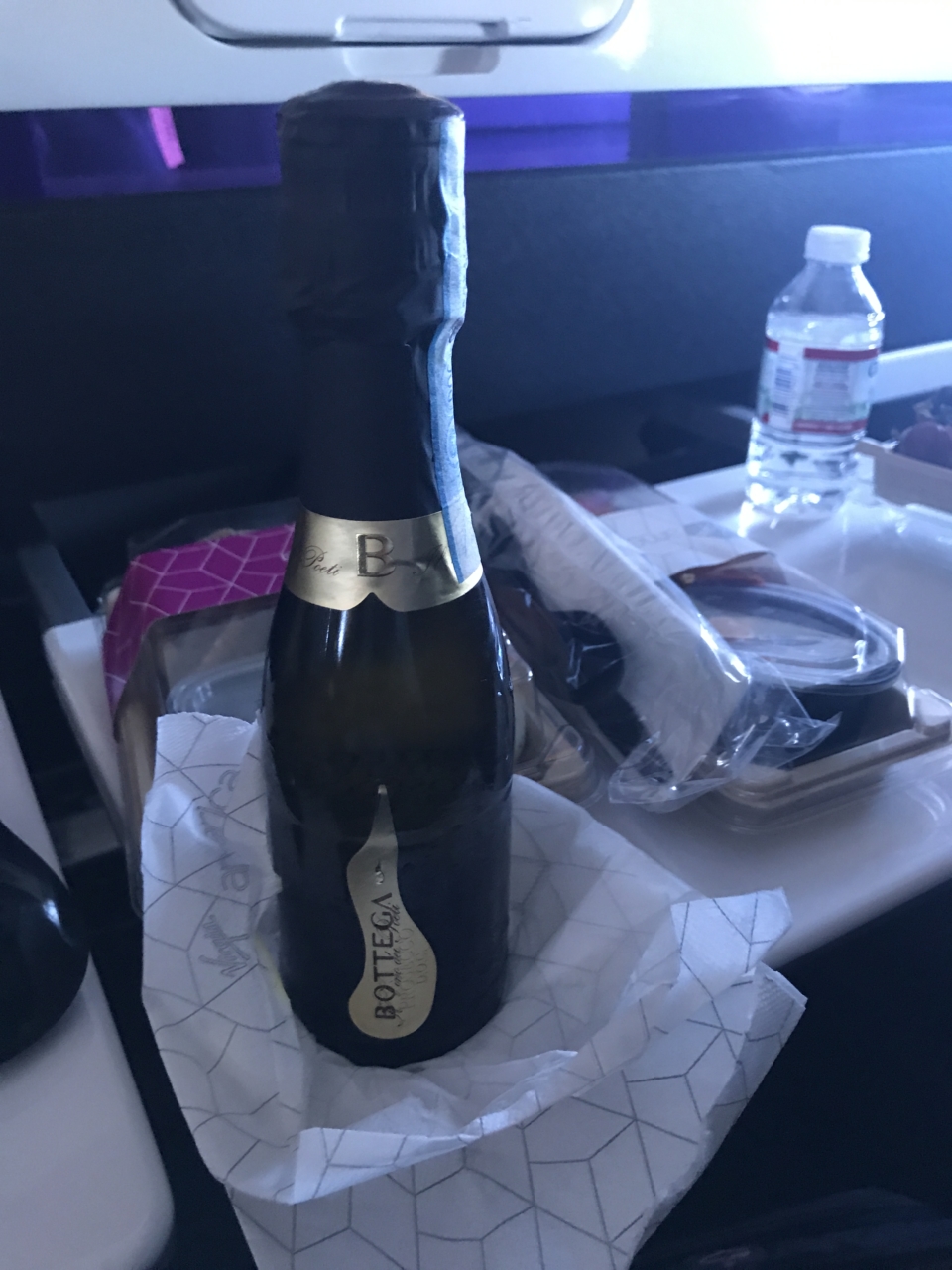 a bottle of champagne on a table