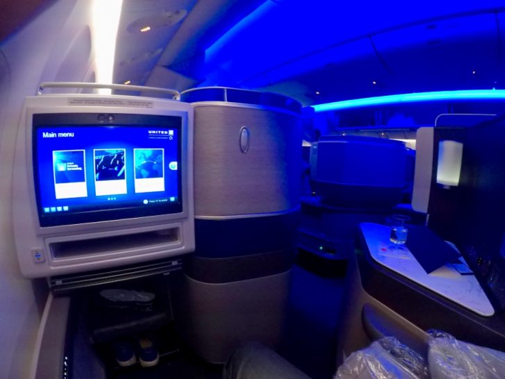 a tv and monitor in an airplane