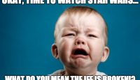 a baby crying with white text