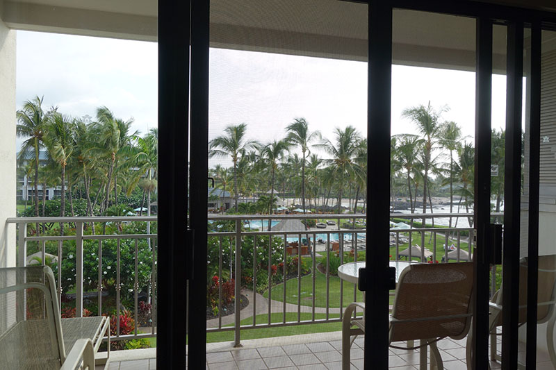 a view of a beach from a balcony