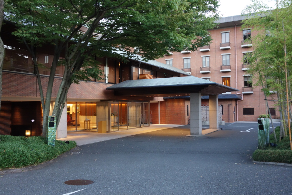 a building with a tree in front of it