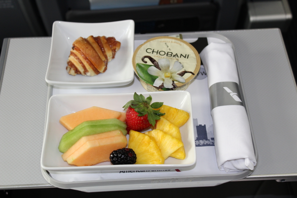 a tray of food on a plane