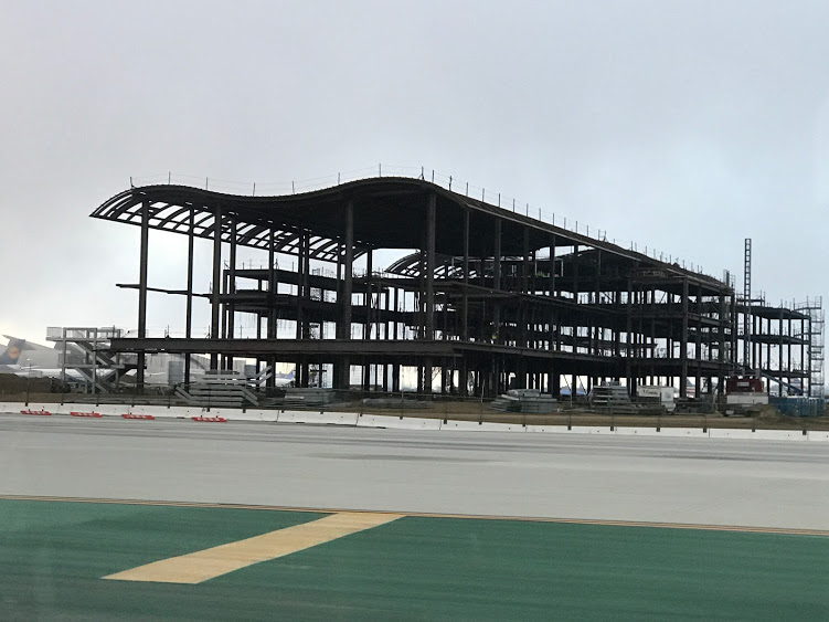 a building under construction on a runway