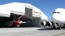 a plane parked in a hangar