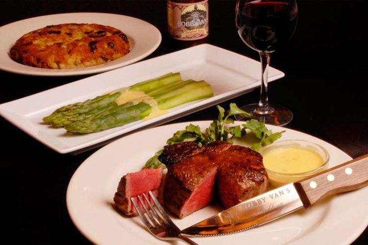 a plate of food with a knife and fork