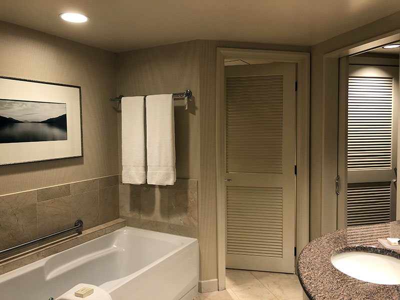 a bathroom with a bathtub and sink