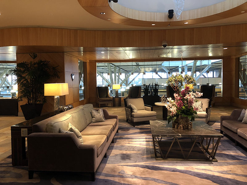 a room with couches and chairs