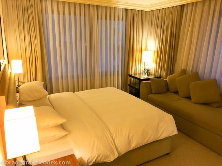 a room with a bed and a couch