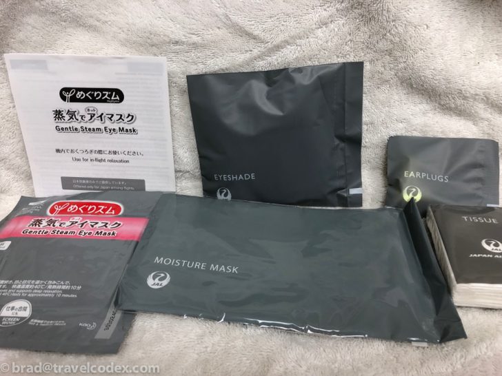 a group of black packages with white text