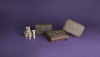 a group of cosmetic bags and a small bag