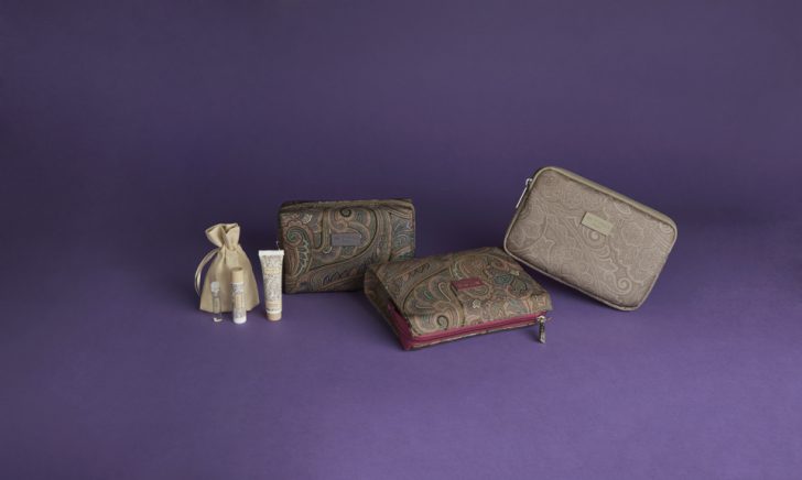 a group of cosmetic bags and a small bag