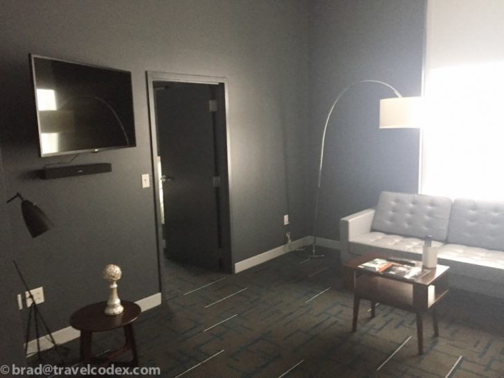 a room with a couch and a tv