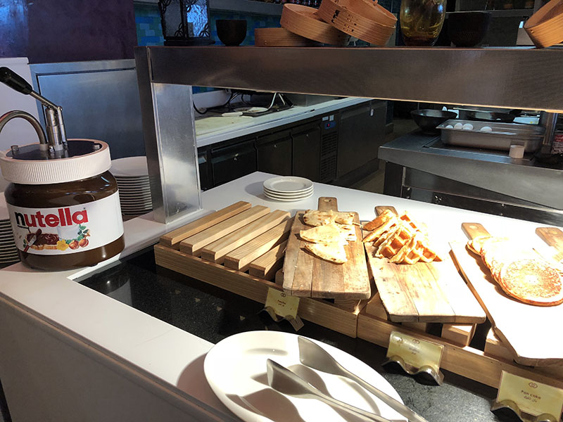 a kitchen with a variety of food items on it