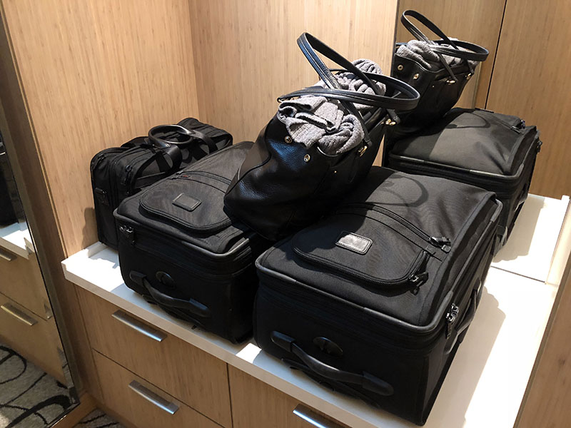 a group of luggage on a counter