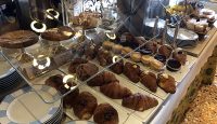 a display case of pastries and pastries