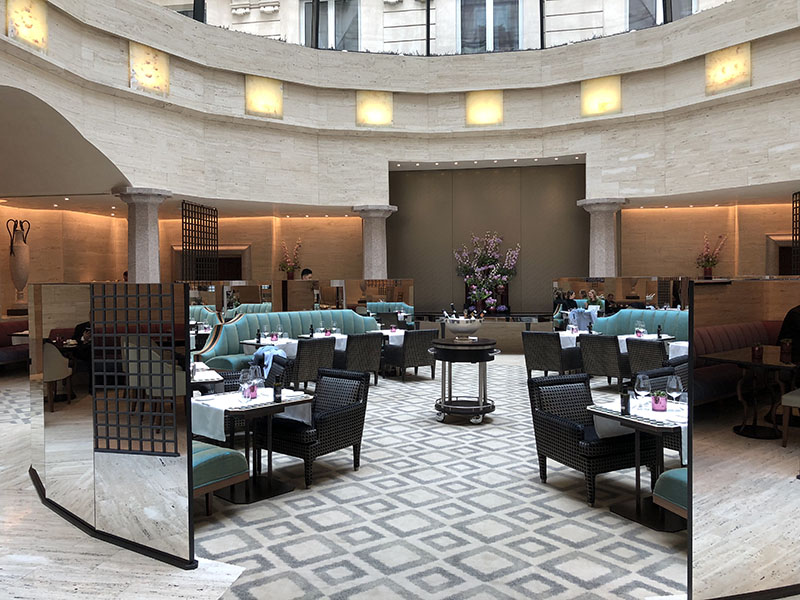 a restaurant with tables and chairs