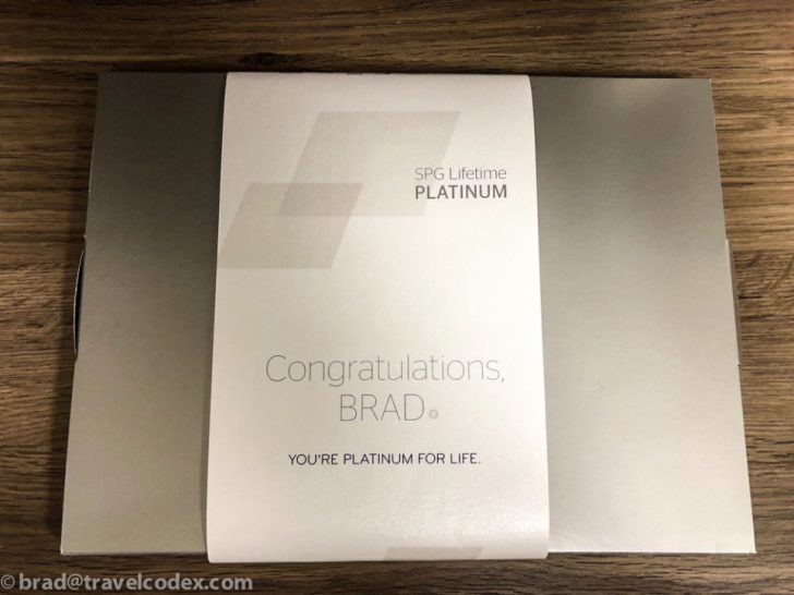 a silver rectangular object with a white label