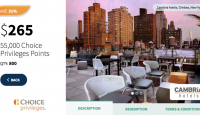 a rooftop patio with chairs and tables