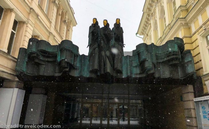 a group of statues on a building