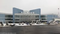 a building with a lot of vehicles parked outside