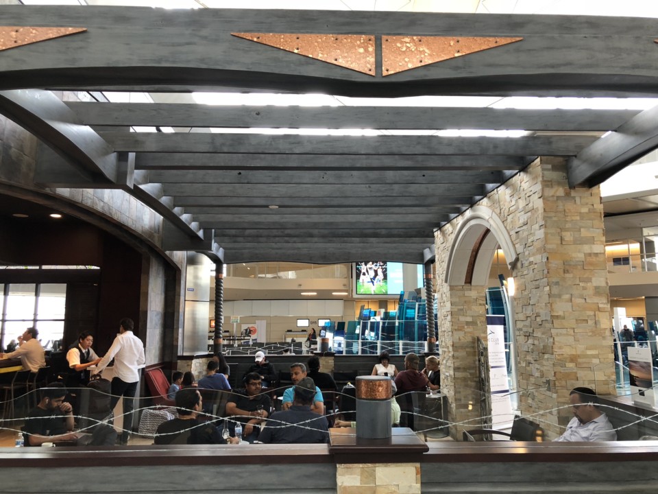 people sitting at a table in a building