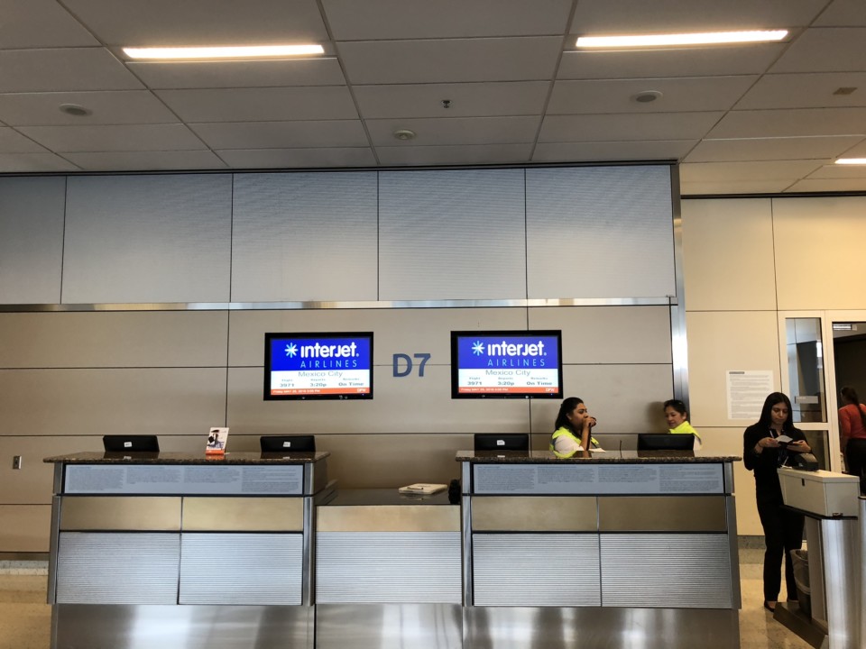 people standing in front of a counter