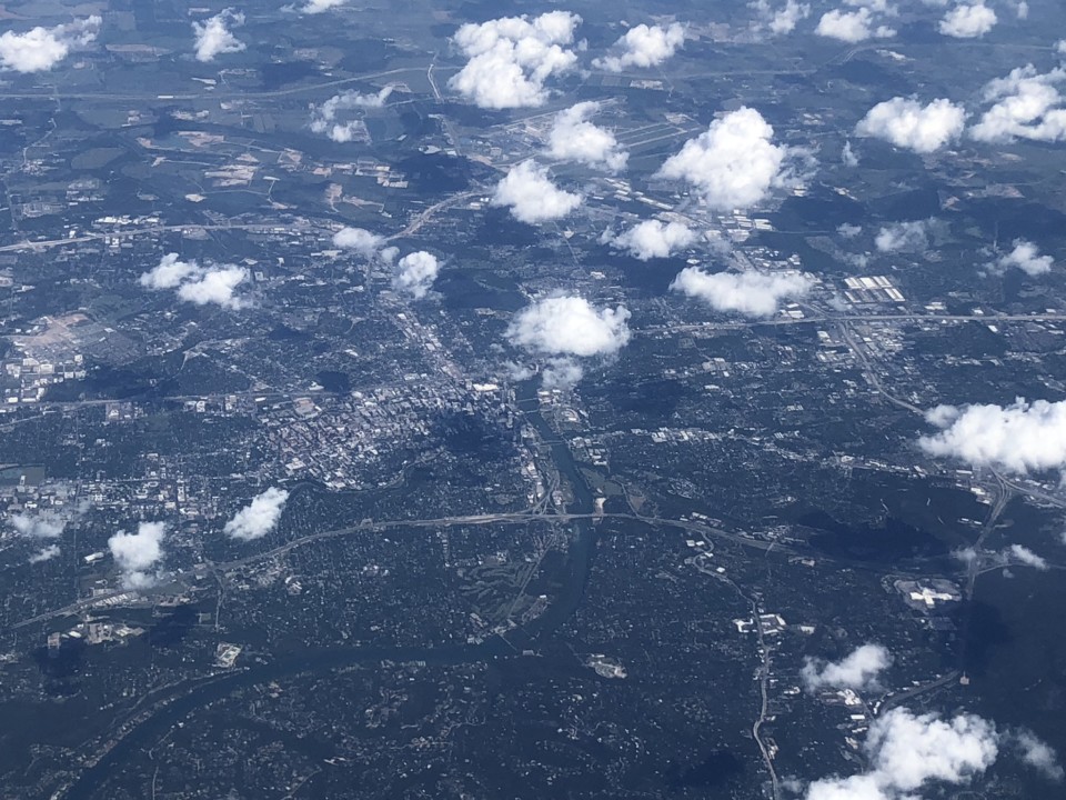 aerial view of a city and clouds
