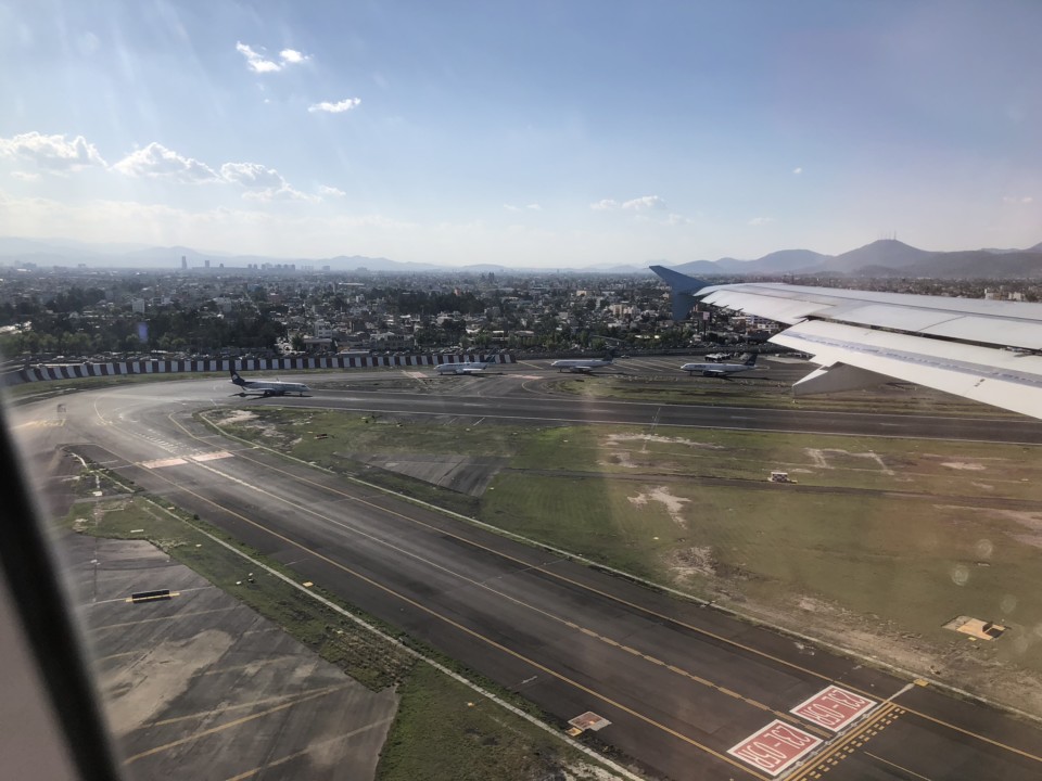 an airplane wing on a runway