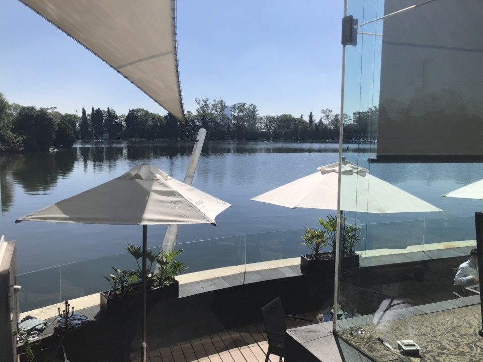 a view of a lake from a restaurant