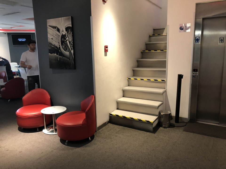 a stairs and chairs in a room