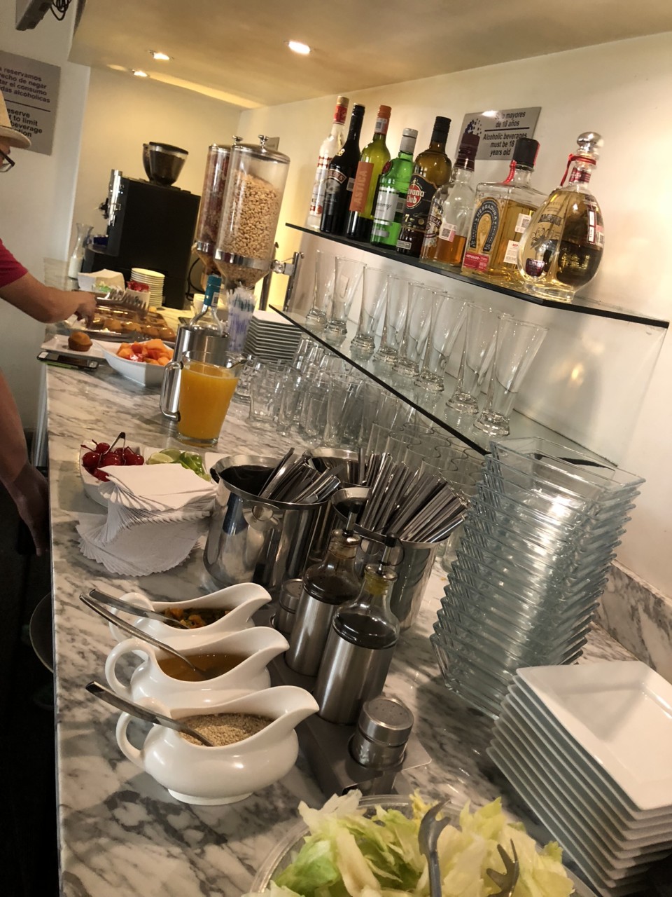 a counter with food and drinks on it