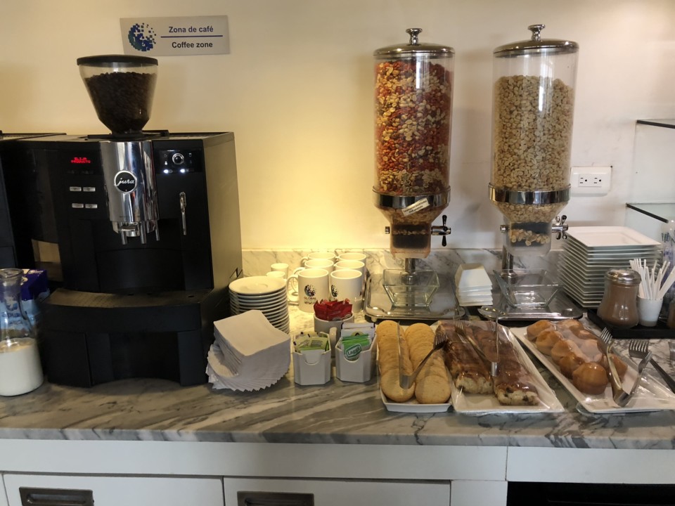 a coffee machine and food on a counter