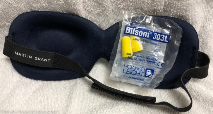 a sleeping mask with earplugs