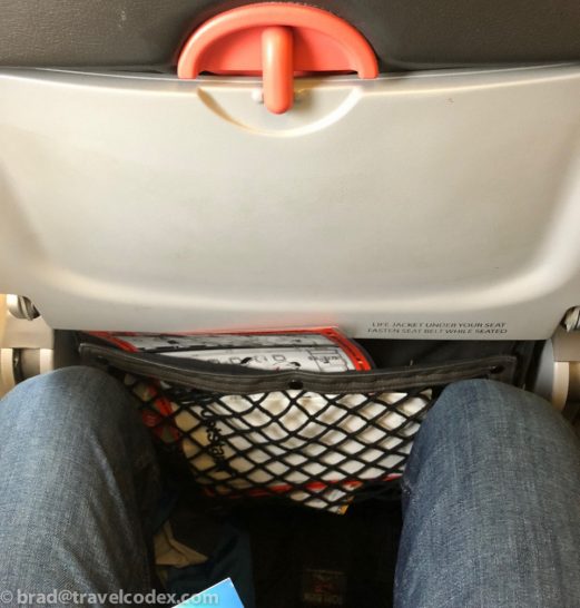 a person's legs in a net bag